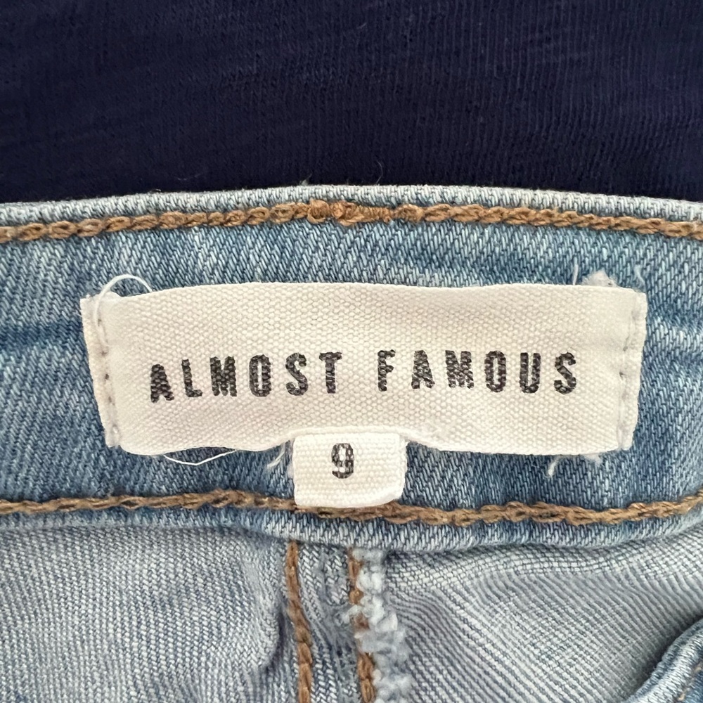 Almost Famous Light Wash Denim Jeans with Navy and Purple Top Accents